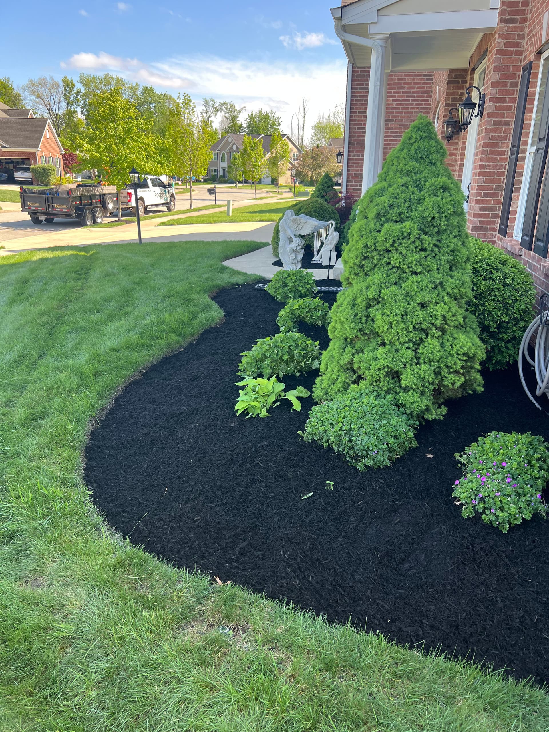 Black Mulch Install Finished Strong in Fishers image