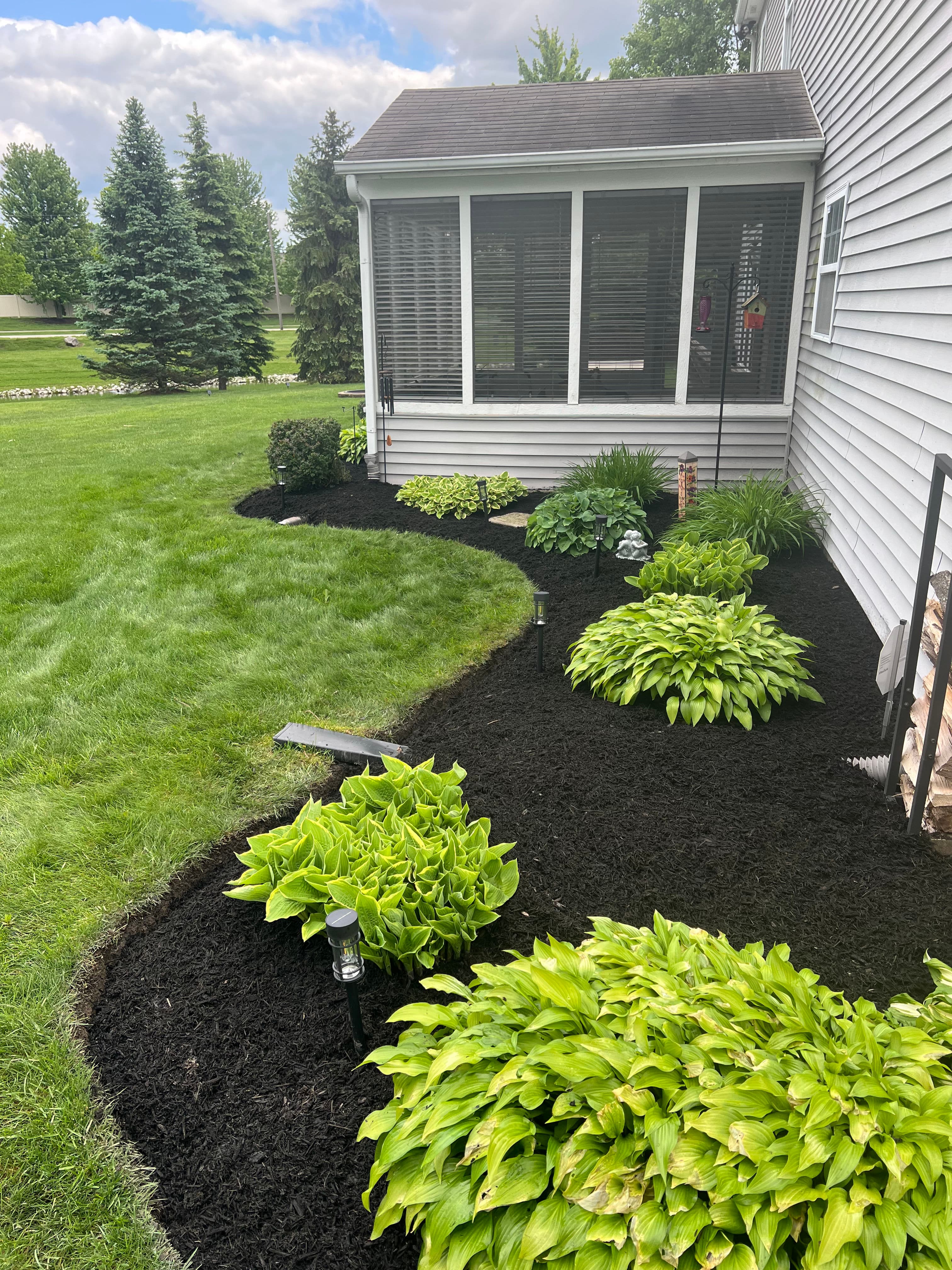 Project Fresh Mulch and Clean Bed Lines Make This Yard Pop image