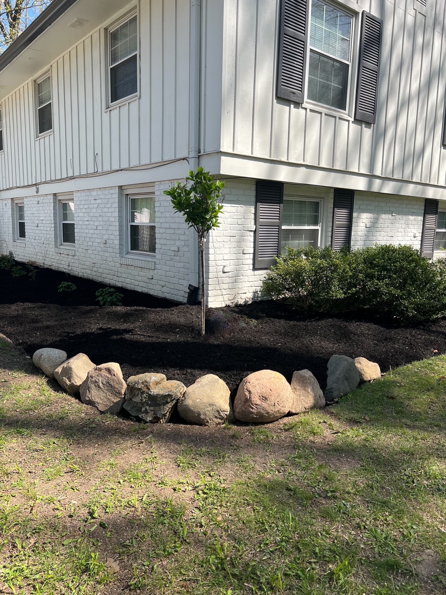 Fresh Landscape Bed with Boulder Edging in Indianapolis image